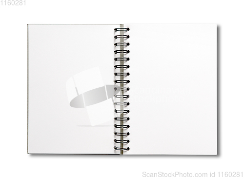 Image of Blank open spiral notebook isolated on white