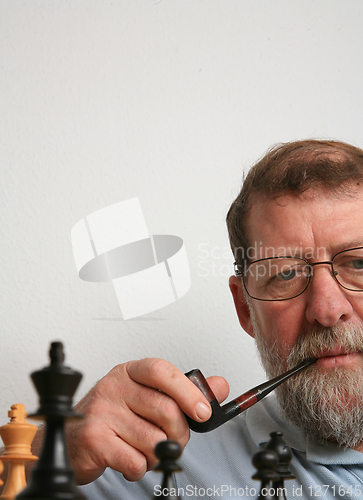 Image of Mature scandinavian man playing chess