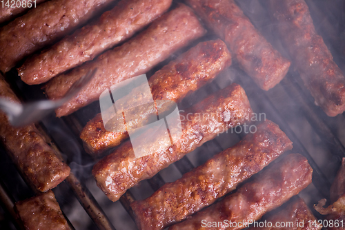 Image of delicious grilled meat on barbecue