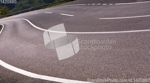 Image of asphalt road in beautiful countryside