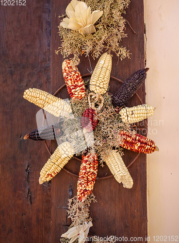 Image of Vintage corn decoration on a door