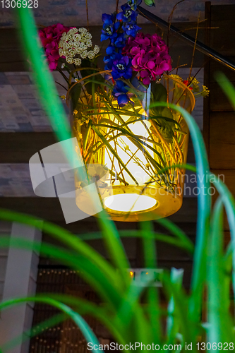 Image of Decoration with flowers in cafe.