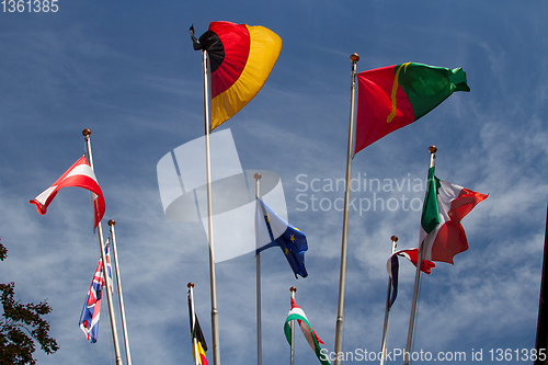 Image of Many europeans flags in the wind against the sky