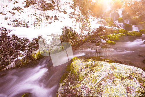 Image of beautiful winter waterfall