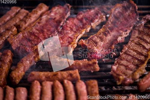 Image of delicious grilled meat on barbecue