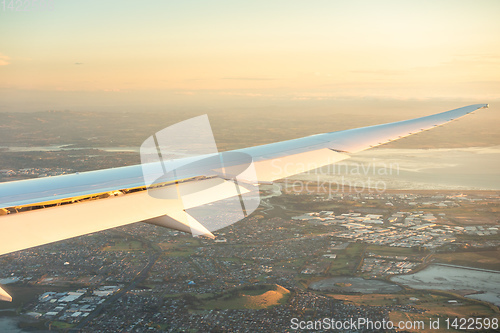 Image of passenger airplane in the evening sun