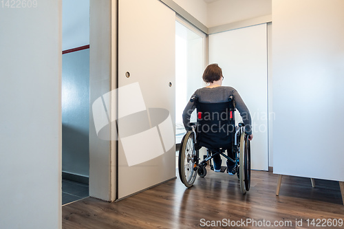 Image of disabled woman in her apartment