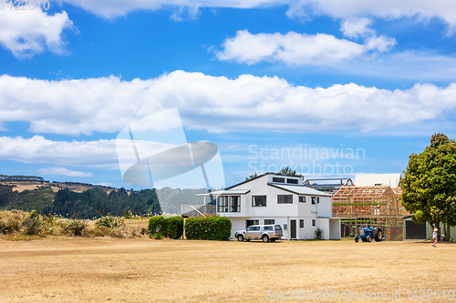 Image of scenery with house in New Zealand