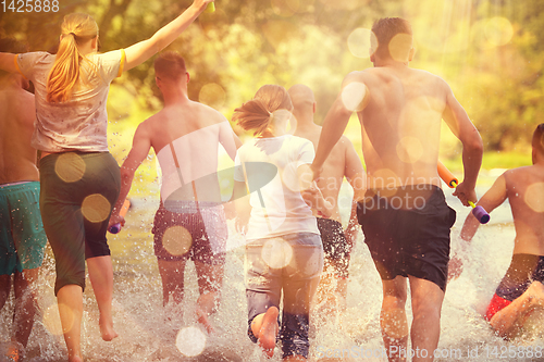 Image of summer joy friends having fun on river