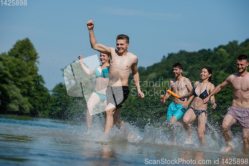 Image of summer joy friends having fun on river