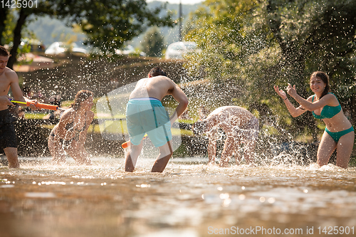 Image of summer joy friends having fun on river