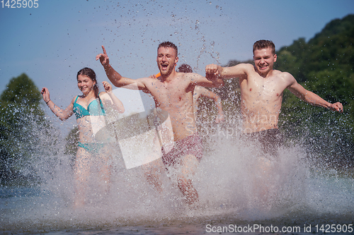 Image of summer joy friends having fun on river