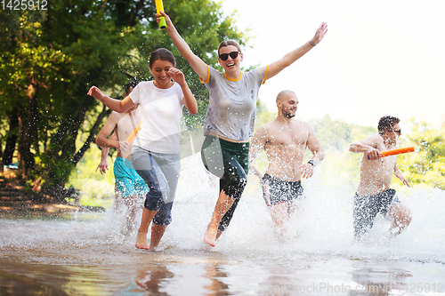 Image of summer joy friends having fun on river