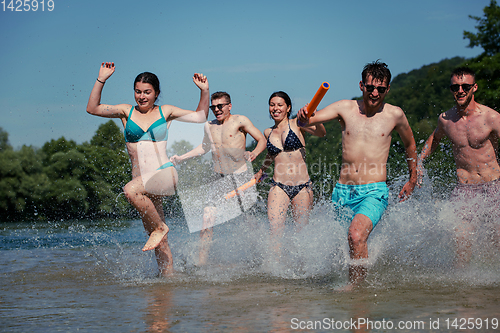 Image of summer joy friends having fun on river