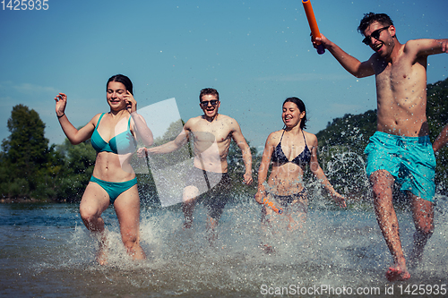 Image of summer joy friends having fun on river
