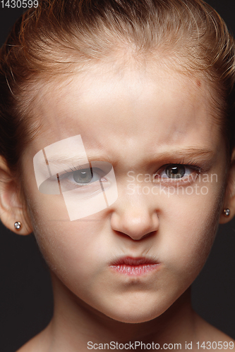 Image of Close up portrait of a little emotional girl