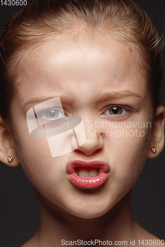 Image of Close up portrait of a little emotional girl