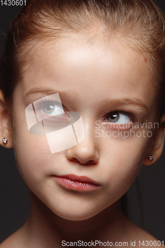 Image of Close up portrait of a little emotional girl