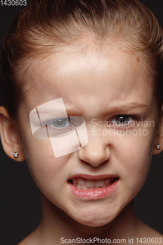 Image of Close up portrait of a little emotional girl