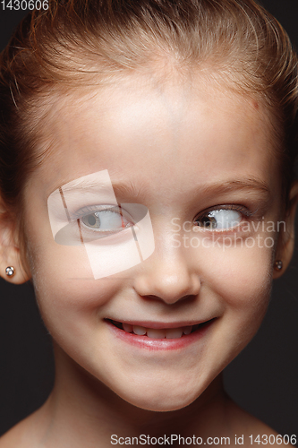 Image of Close up portrait of a little emotional girl