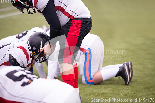 Image of professional american football players training