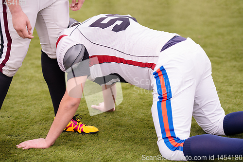 Image of professional american football players training