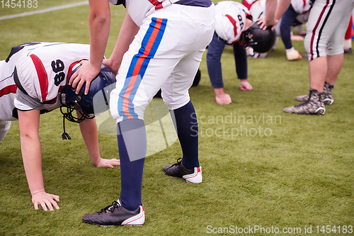 Image of professional american football players training