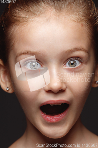 Image of Close up portrait of a little emotional girl