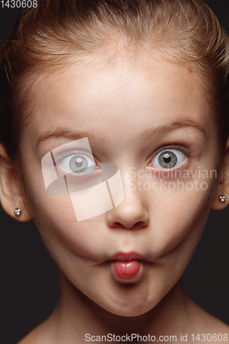 Image of Close up portrait of a little emotional girl