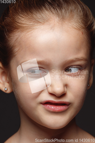 Image of Close up portrait of a little emotional girl