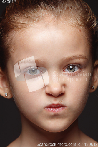 Image of Close up portrait of a little emotional girl