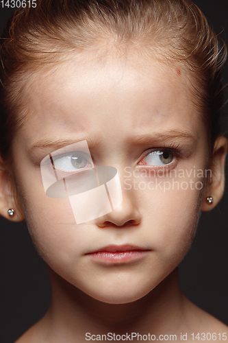 Image of Close up portrait of a little emotional girl