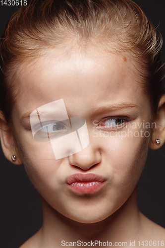 Image of Close up portrait of a little emotional girl