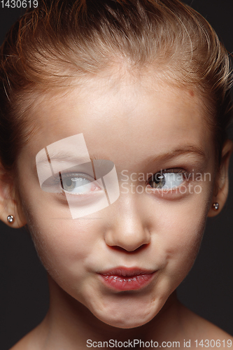 Image of Close up portrait of a little emotional girl