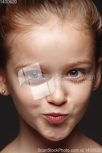 Image of Close up portrait of a little emotional girl
