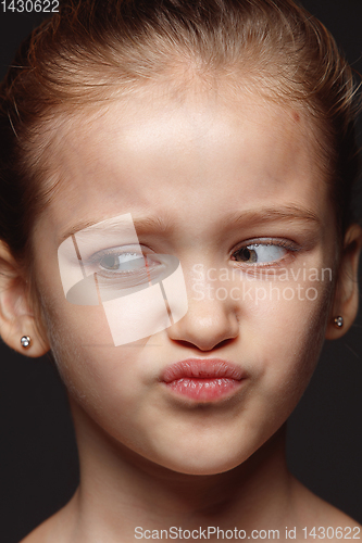 Image of Close up portrait of a little emotional girl