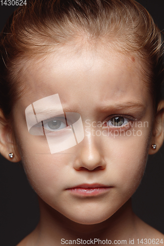 Image of Close up portrait of a little emotional girl
