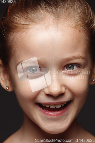 Image of Close up portrait of a little emotional girl