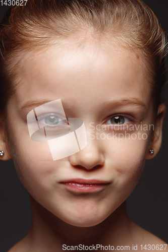 Image of Close up portrait of a little emotional girl