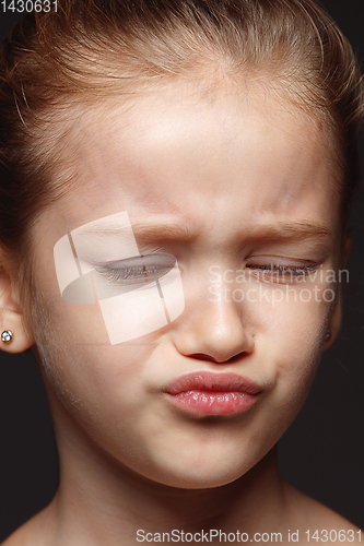 Image of Close up portrait of a little emotional girl