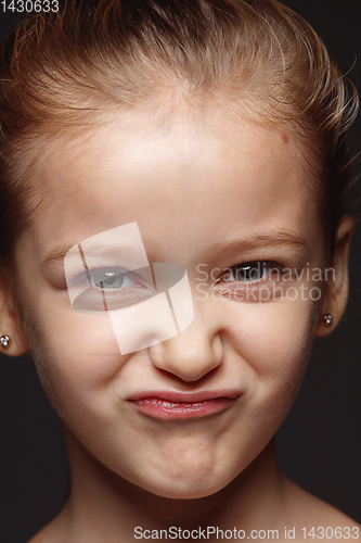 Image of Close up portrait of a little emotional girl