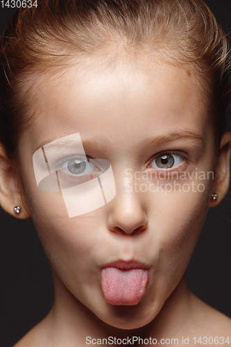 Image of Close up portrait of a little emotional girl