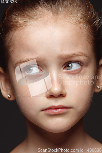 Image of Close up portrait of a little emotional girl