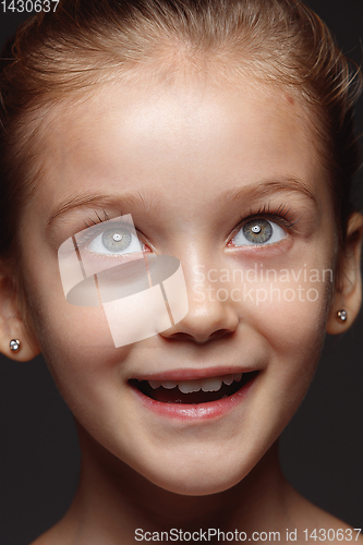 Image of Close up portrait of a little emotional girl