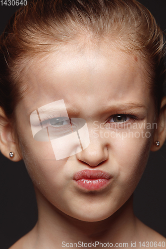 Image of Close up portrait of a little emotional girl