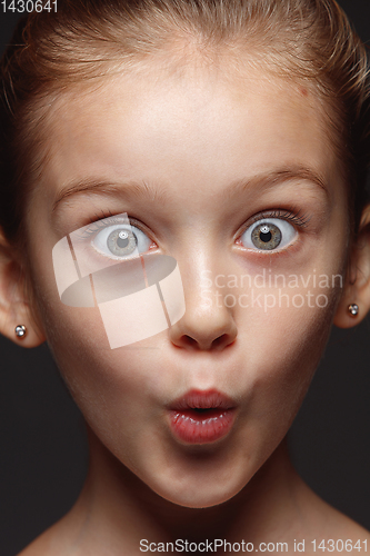 Image of Close up portrait of a little emotional girl