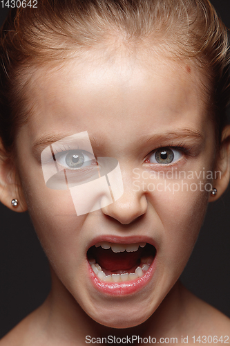 Image of Close up portrait of a little emotional girl