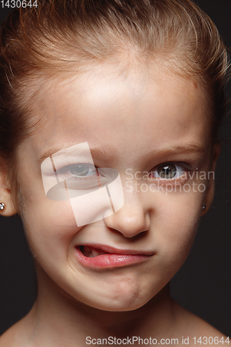 Image of Close up portrait of a little emotional girl