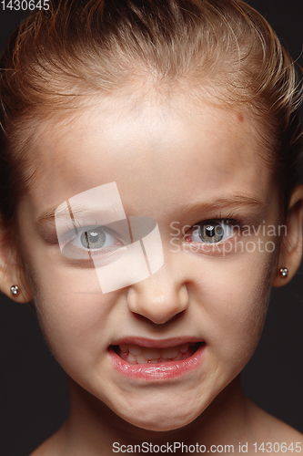 Image of Close up portrait of a little emotional girl