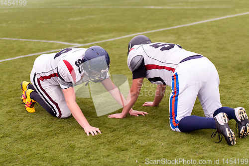 Image of professional american football players training